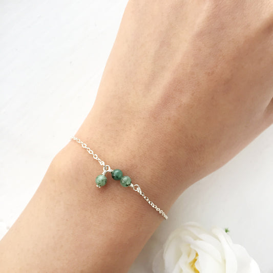 Dainty Emerald Bracelet with Dangling Charm